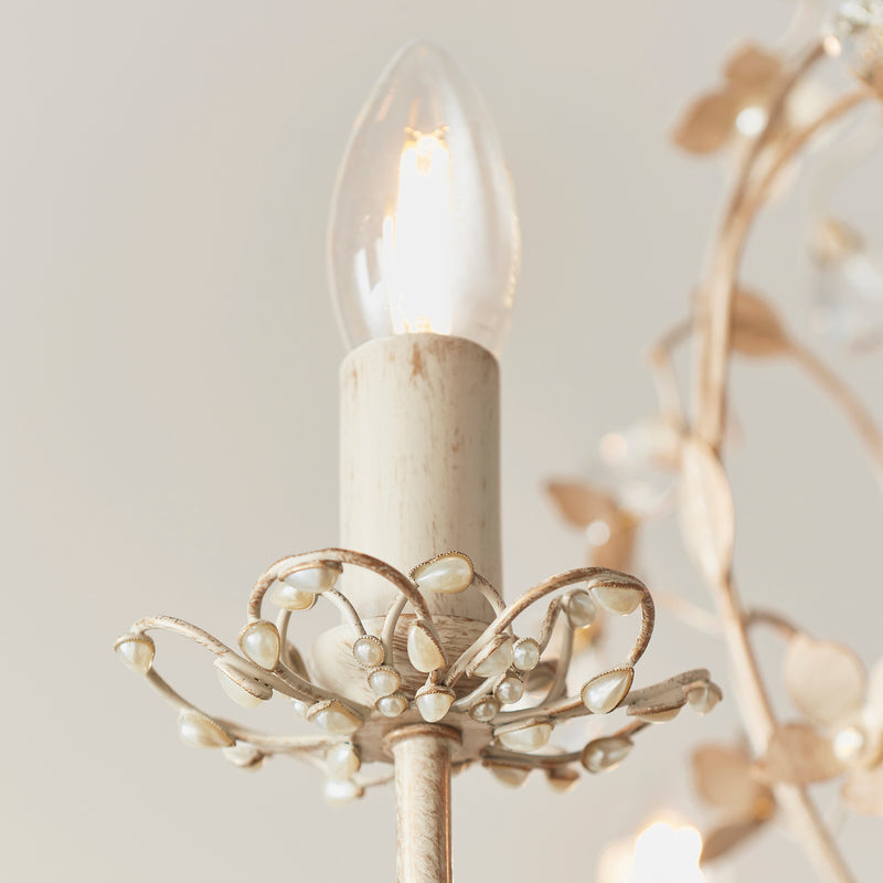 Detail of the cream and brushed gold finish on the Lullaby 3 Light Chandelier