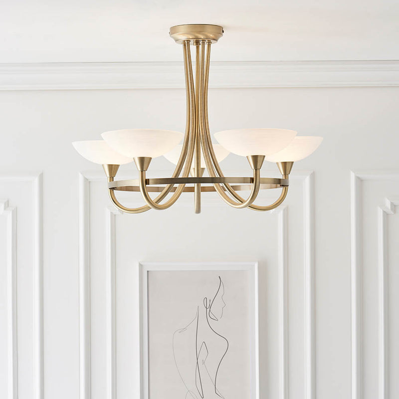 Cagney 5 Light Semi Flush Ceiling Light lit up in a styled living room