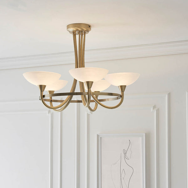 Cagney 5 Light Semi Flush Ceiling Light in antique brass shown in a room setting