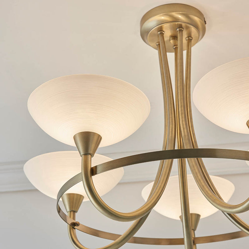 Detail of the antique brass finish on the Cagney 5 Light Semi Flush Ceiling Light