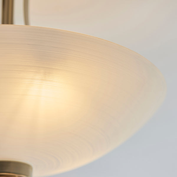 Close-up of the white glass on the Welles 3 Light Semi Flush Ceiling Light