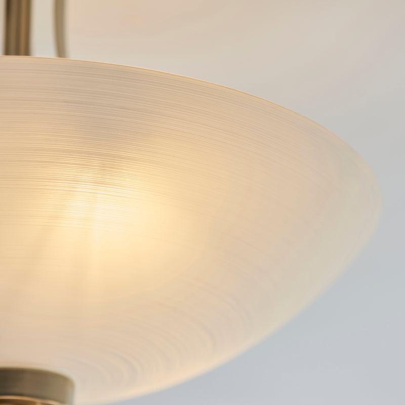 Close-up of the white glass on the Welles 3 Light Semi Flush Ceiling Light