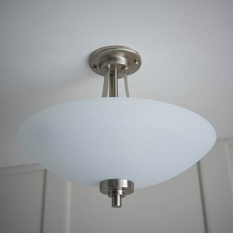 Close-up of the white glass on the Welles 3 Light Semi Flush Ceiling Light