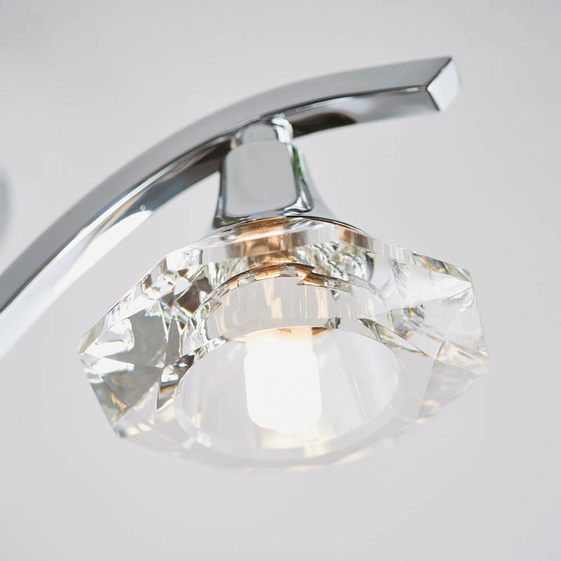 Close-up of the Langella 3 Light Crystal Semi Flush Ceiling Light ceiling plate and fittings