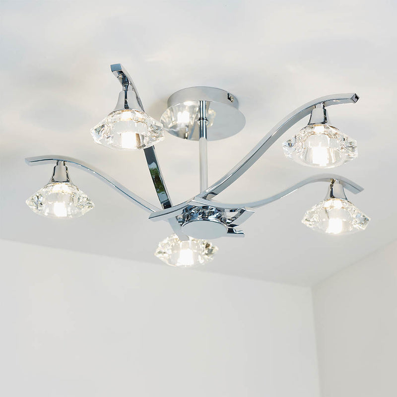 Langella 5 Light Crystal Semi Flush Ceiling Light in chrome on a living room ceiling