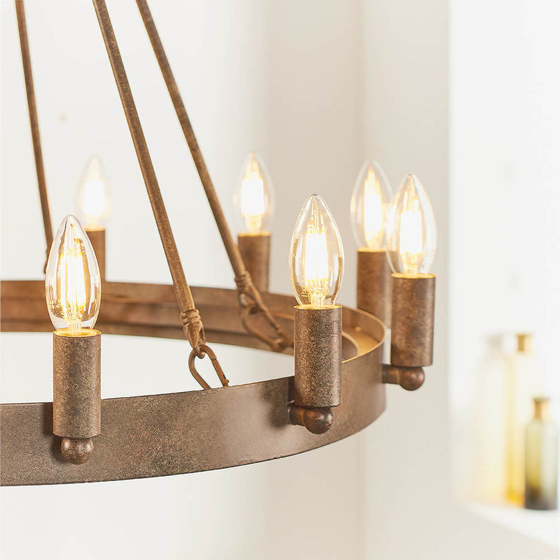 Detail of the aged metal finish on the Chevalier 12 Light Candle Chandelier