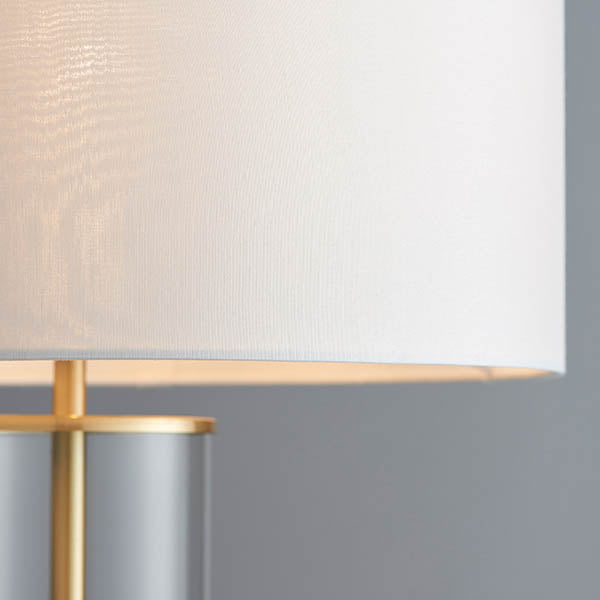 Lessina Touch Table Lamp lit up in a bedroom setting