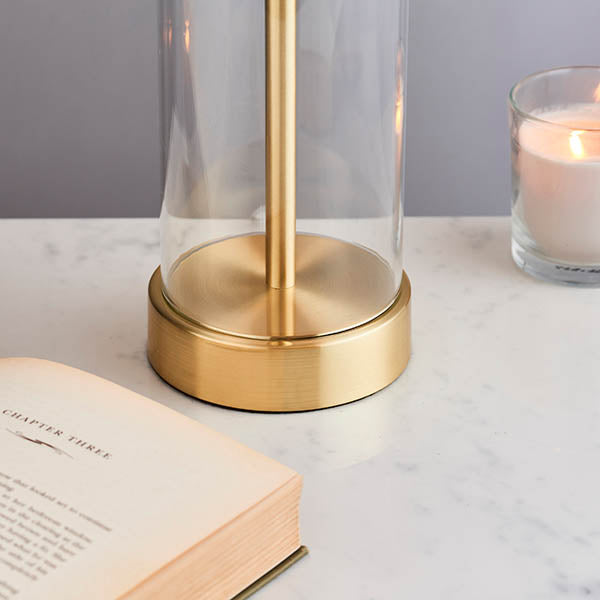Lessina Touch Table Lamp lit up in a bedroom setting