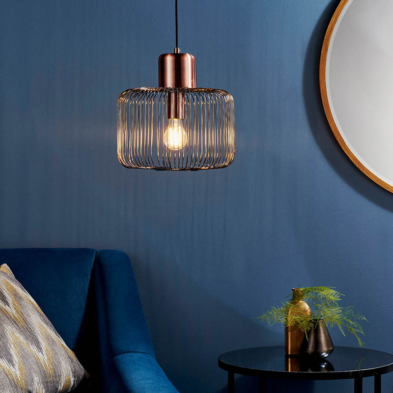Nicola Cage Pendant in antique copper hanging in a kitchen