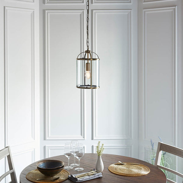 Lambeth Lantern Pendant lit up in a styled hallway