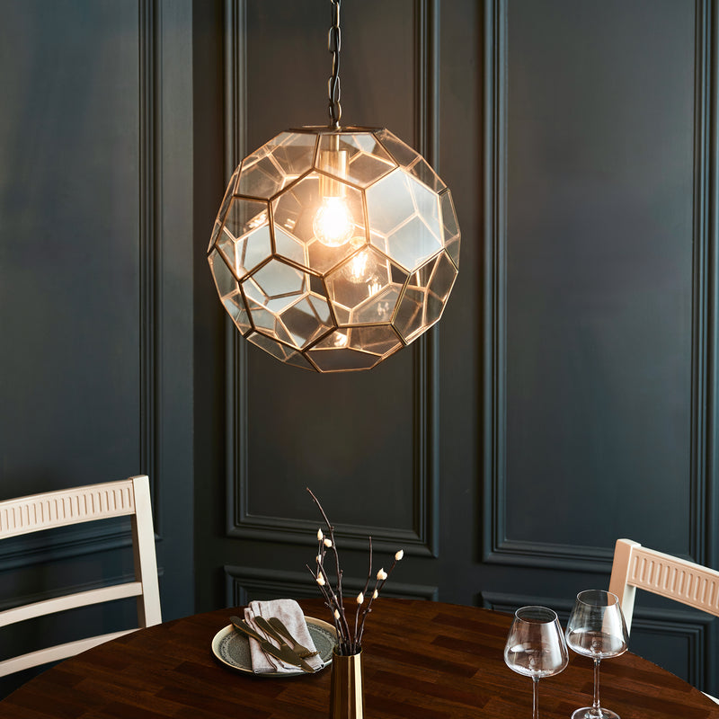 Miele Pendant lit up in a styled hallway