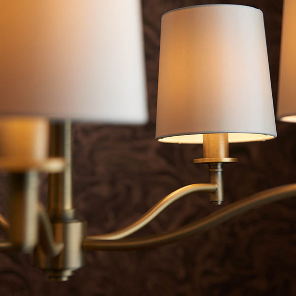 Close-up of the vintage white fabric on the Ortona 5 Light Chandelier
