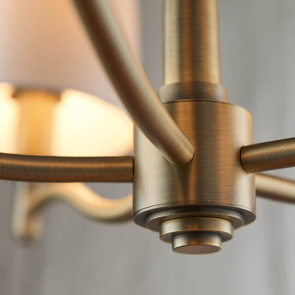 Detail of the matt antique brass finish on the Ortona 5 Light Chandelier