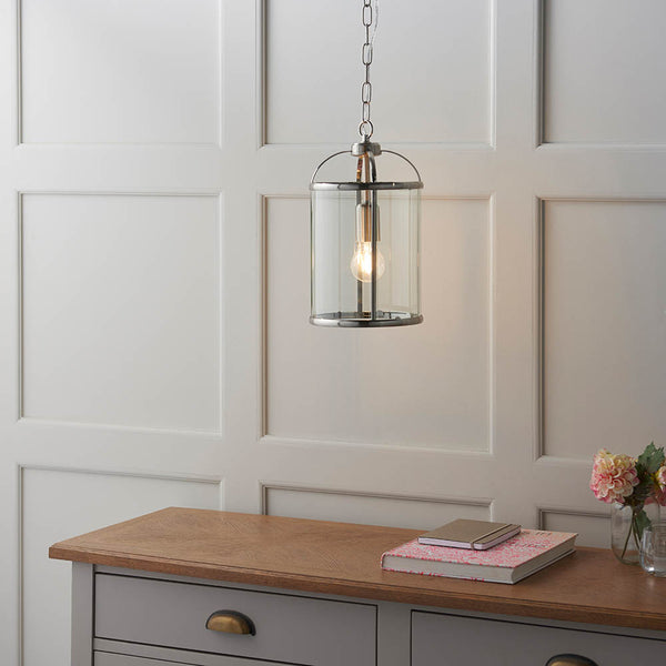 Lambeth Lantern Pendant lit up in a styled hallway