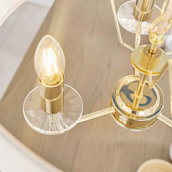 Close-up of the vintage white fabric on the Nixon 3 Light Chandelier