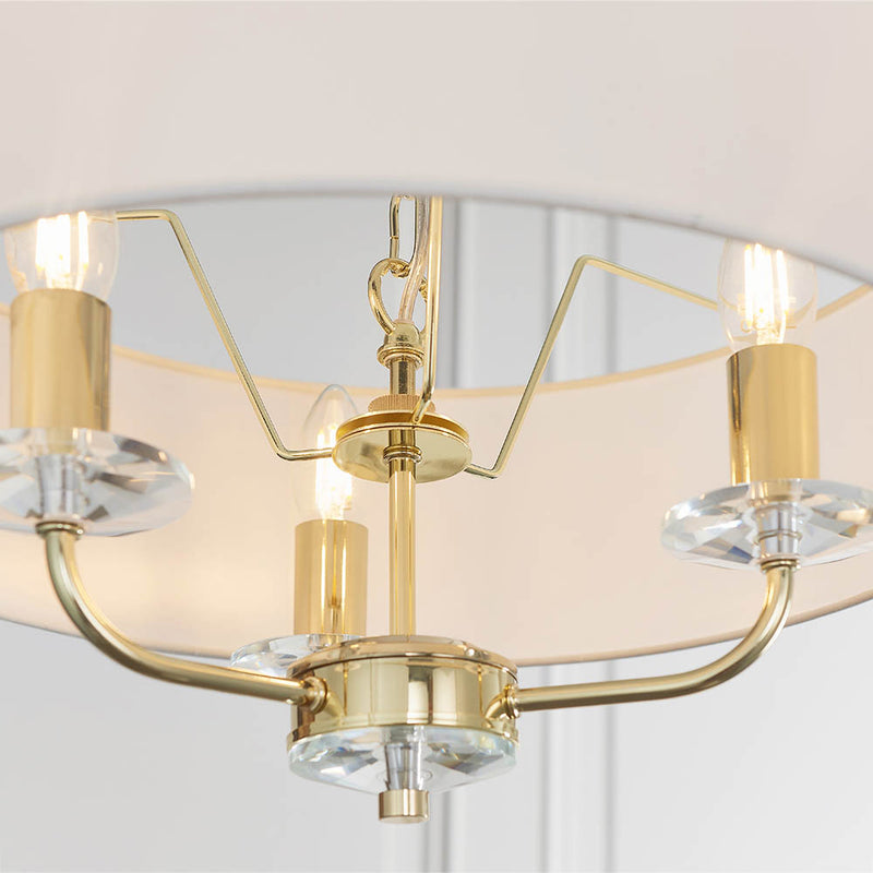 Detail of the brass finish on the Nixon 3 Light Chandelier