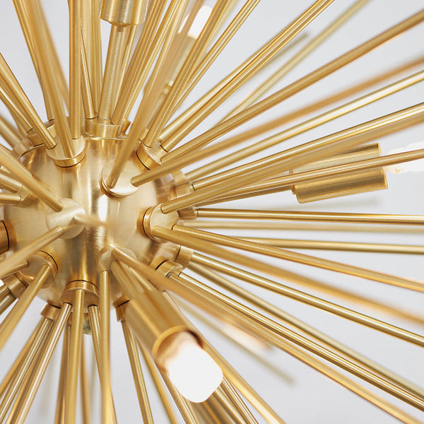 Orta 9 Light Sputnik Pendant lit up in a styled living room