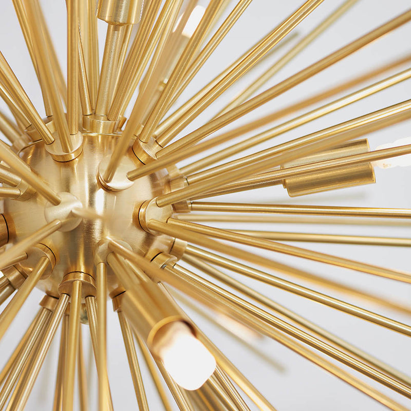 Orta 9 Light Sputnik Pendant lit up in a styled living room