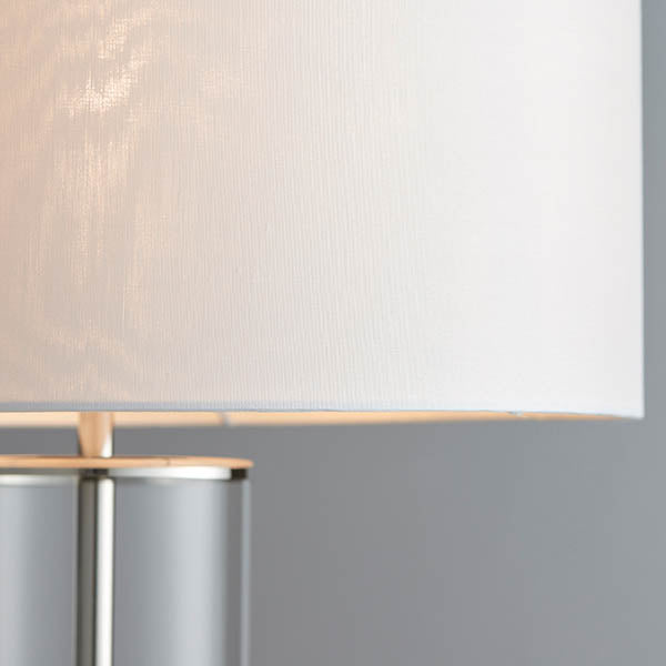Lessina Touch Table Lamp lit up in a bedroom setting