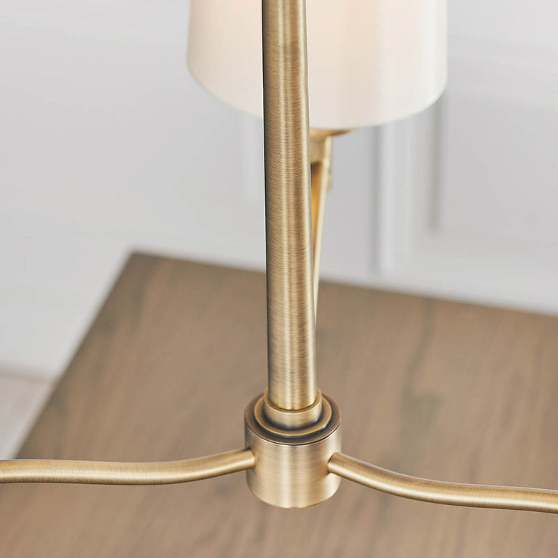 Close-up of the vintage white fabric on the Ortona 3 Light Chandelier