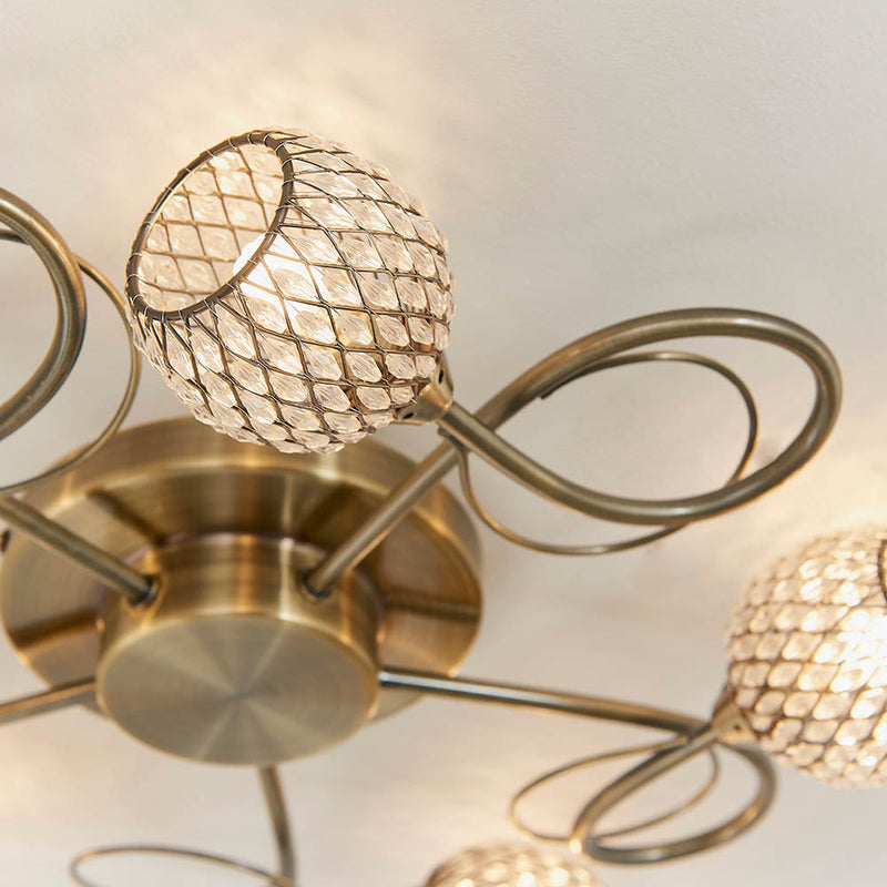 Detail of the antique brass finish on the Aherne 5 Light Flush Ceiling Light