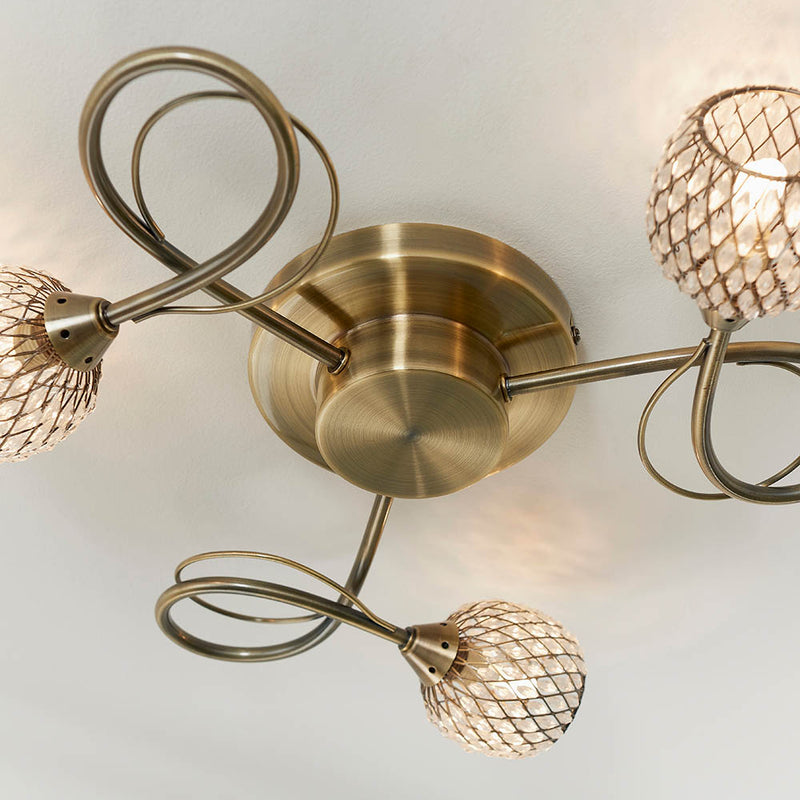Close-up of the metalwork on the Aherne 3 Light Flush Ceiling Light