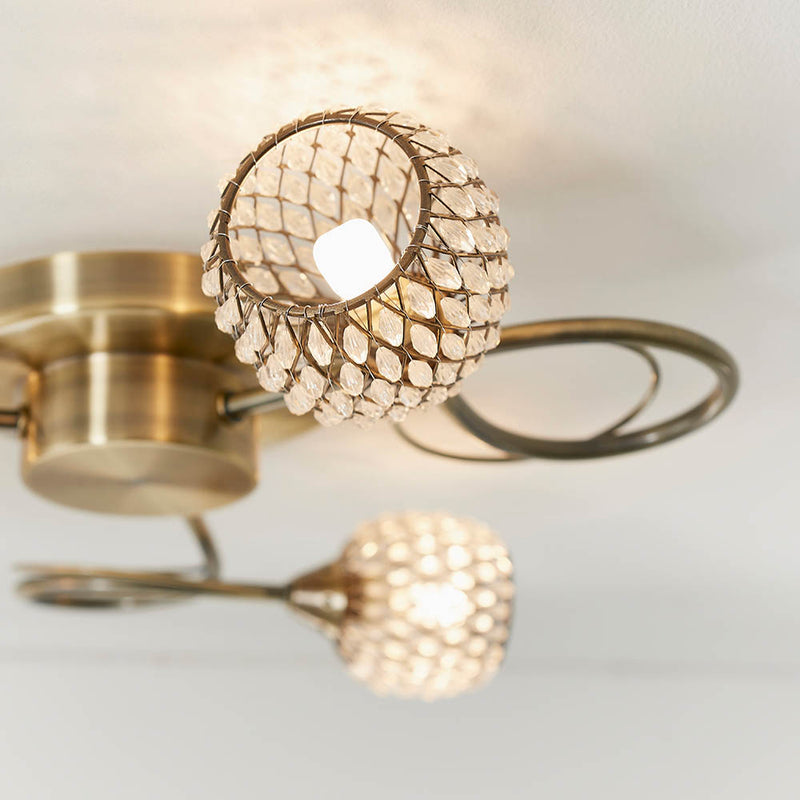 Close-up of the Aherne 3 Light Flush Ceiling Light ceiling plate and fittings