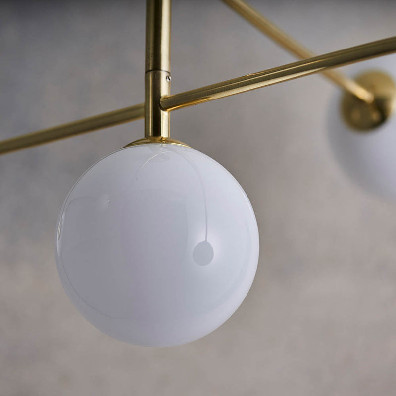 Detail of the satin brass finish on the Otto 5 Light Semi Flush Ceiling Light