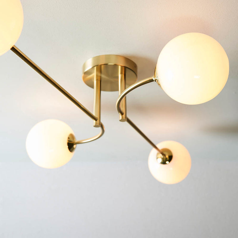 Detail of the satin brass finish on the Otto 4 Light Semi Flush Ceiling Light