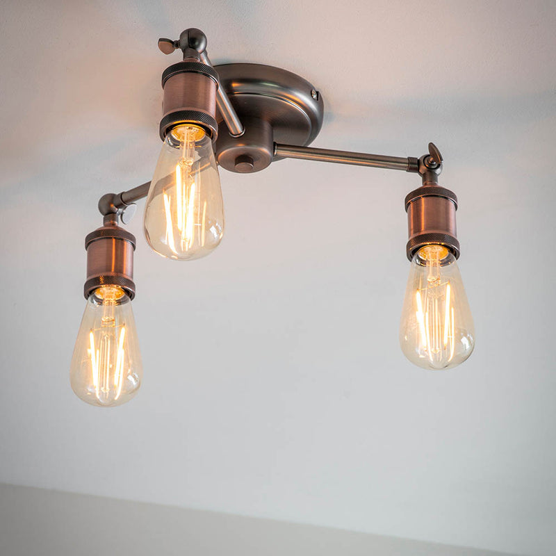 Hal 3 Light Semi Flush Ceiling Light in aged pewter and copper on a kitchen ceiling