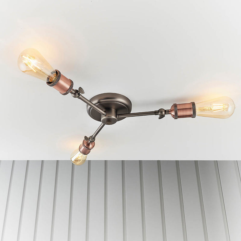 Detail of the aged pewter and copper finish on the Hal 3 Light Semi Flush Ceiling Light