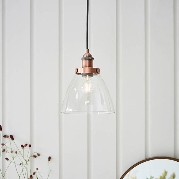Hansen Pendant in aged copper hanging in a kitchen