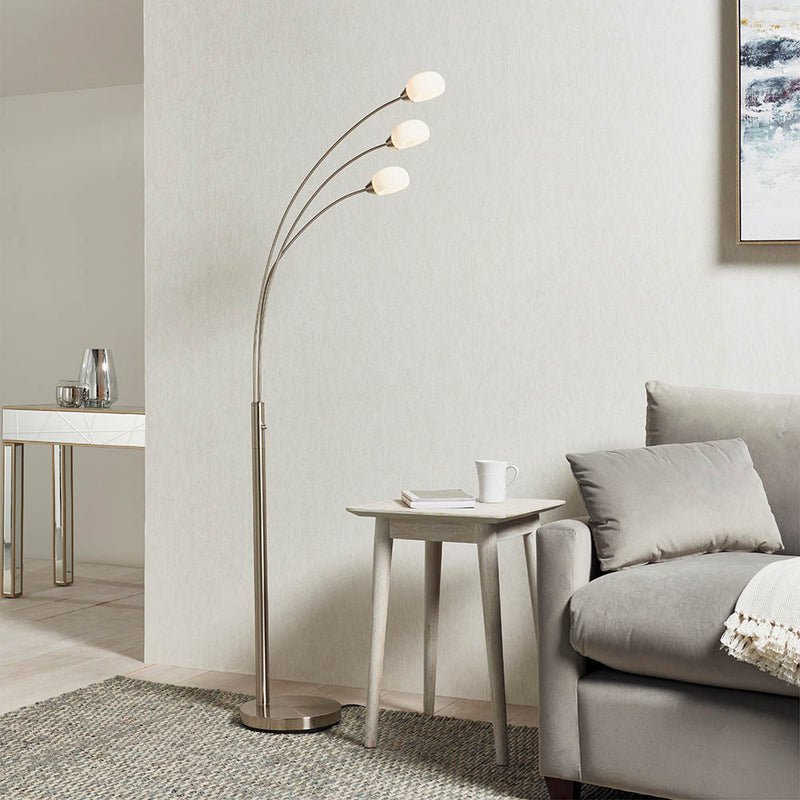 Endon Jaspa 3 Light LED Arc Floor Lamp in satin nickel in a styled living room