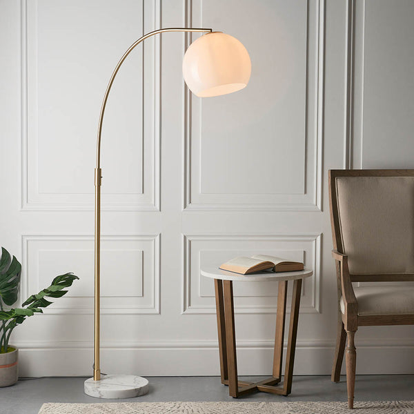 Endon Otto Floor Lamp in satin brass and white marble in a styled living room