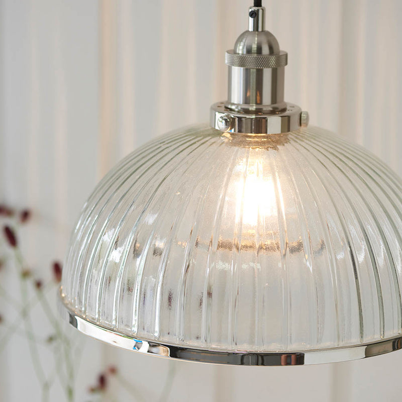 Hansen Ribbed Pendant lit up in a styled kitchen
