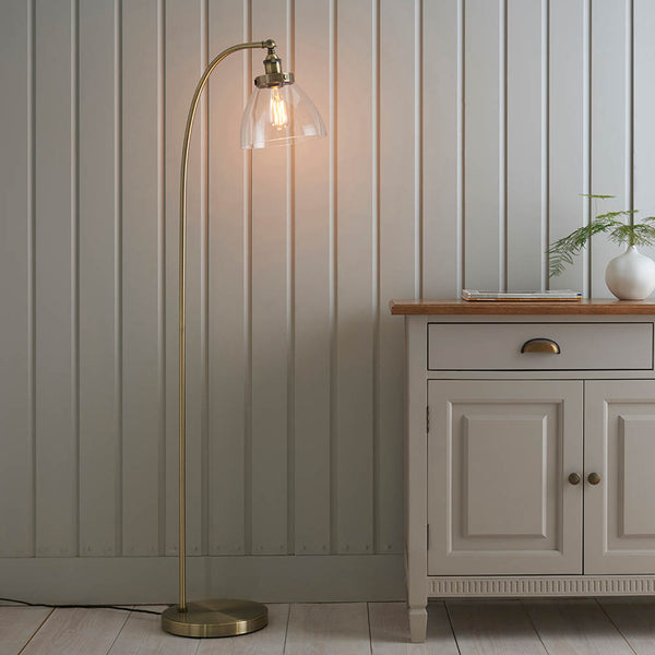 Endon Hansen Floor Lamp in antique brass in a styled living room