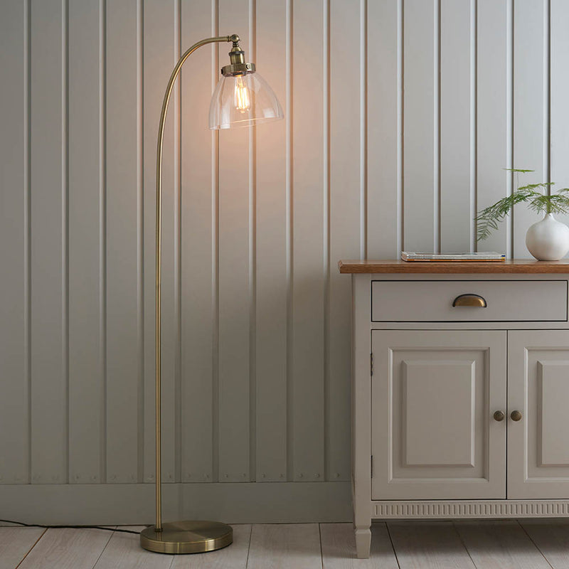 Endon Hansen Floor Lamp in antique brass in a styled living room
