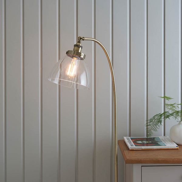 Hansen Floor Lamp lit up in a living room setting