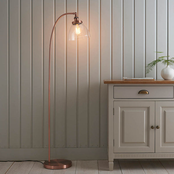 Endon Hansen Floor Lamp in aged copper in a styled living room