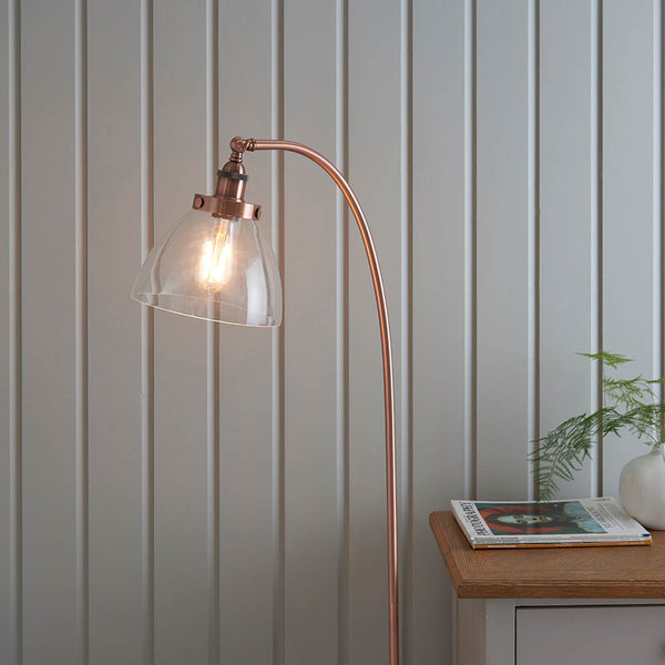 Hansen Floor Lamp lit up in a living room setting
