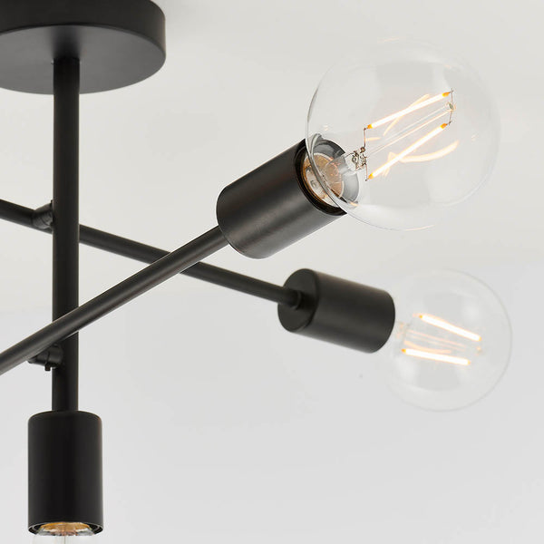 Studio 5 Light Semi Flush Ceiling Light in matt black shown in a room setting