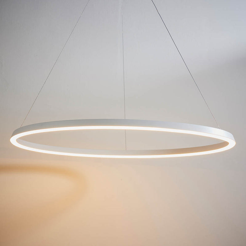 Staten LED Hoop Pendant in matt white hanging in a living room
