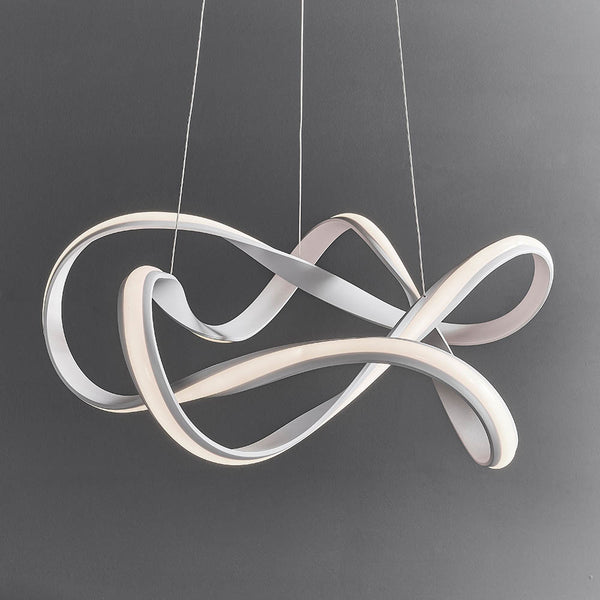 Synergy LED Pendant lit up in a styled living room