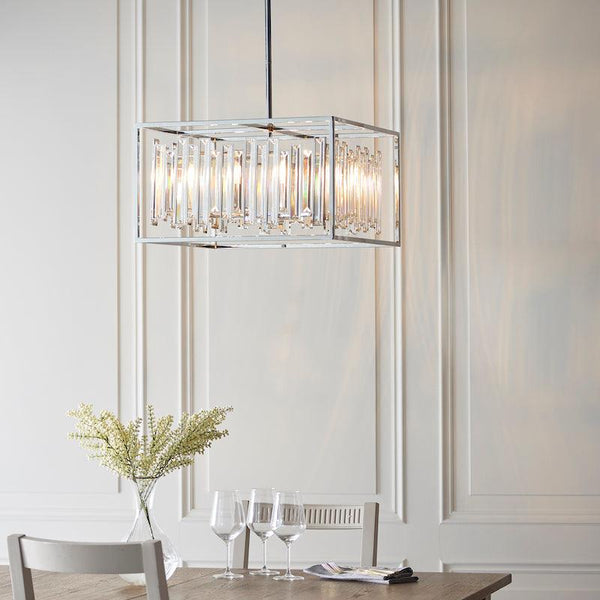 Endon Acadia 6-Light Pendant in Chrome features a modern boxed design, adjustable height, and dimmable functionality. Perfect for dining rooms and contemporary interiors, this geometric pendant light adds a touch of architectural elegance to any space.