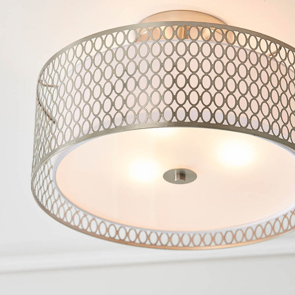 Close-up of the white fabric shade and frosted glass on the Cordero 3 Light Flush Ceiling Light