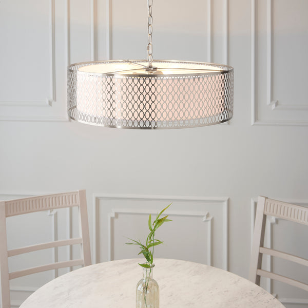 Cordero 3 Light Pendant in satin nickel fretwork shown in a room setting