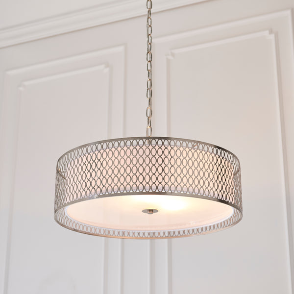 Close-up of the white fabric and frosted glass on the Cordero 3 Light Pendant