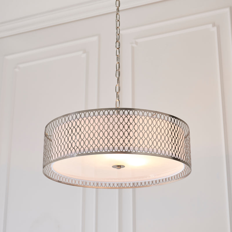 Close-up of the white fabric and frosted glass on the Cordero 3 Light Pendant