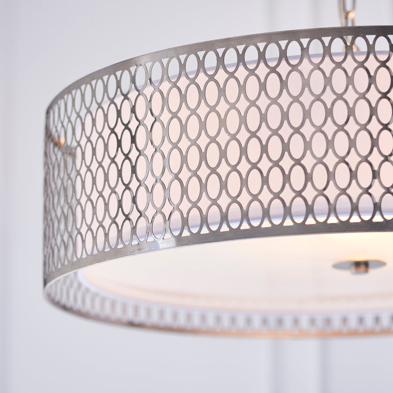 Detail of the satin nickel fretwork finish on the Cordero 3 Light Pendant