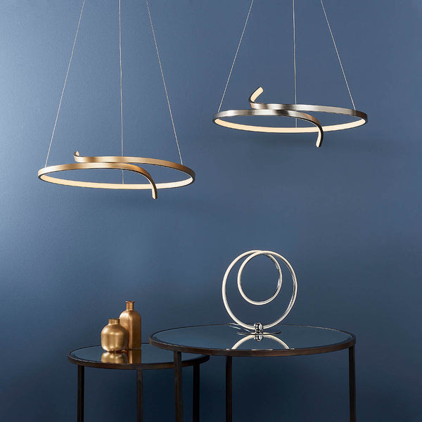 Rafe LED Hoop Pendant lit up in a styled living room